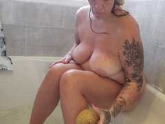 Amateur wife enjoying a relaxing bath
