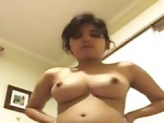 young-looking pretty indian shows her  milk sacks and hairy pussy