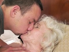 A granny with a fat body is feeling a cock in her wet pussy