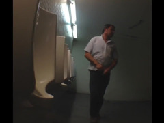 Voyeur films old males in the public restroom