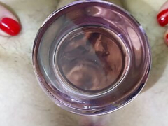 Beefy pussy gripps glass dong close up