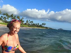 Lyra looks super hot on the beach in Hawaii.