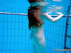 Sexy girl shows magnificent young body underwater