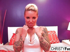 Tattooed Christy uses a toy on her pussy - Christy mack