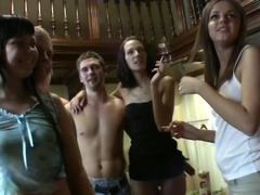 Drunk chicks are stripping and fooling around with some guys
